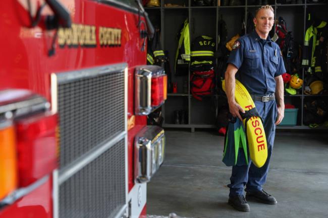 So<em></em>noma County Fire District Capt. Heath Lesik is one of two surf rescue swimmers in the fire district. Last Wednesday, Lesik respo<em></em>nded from the Bodega Bay fire station to Duncan’s Landing after a woman drove her car off the cliff. The fire district is trying to train and recruit more surf rescue swimmers. Photo taken in Forestville, Thursday, Aug. 31, 2023. (Christopher Chung/The Press Democrat)