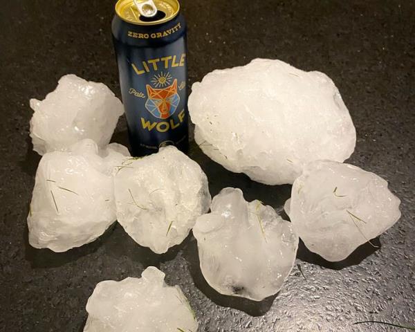 This photo provided by Jeff Ilg shows pieces of ice gathered after a chunk of ice estimated to be 15 to 20 pounds (6 to 9 kilograms) crashed o<em></em>nto the roof of his home, in Shirley, Mass., late Sunday.