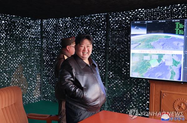 This photo, carried by North Korea's official Korean Central News Agency on April 3, 2024, shows the North's leader Kim Jong-un inspecting the test-firing of a new intermediate-range hyperso<em></em>nic missile the previous day. (For Use o<em></em>nly in the Republic of Korea. No Redistribution) (Yonhap)