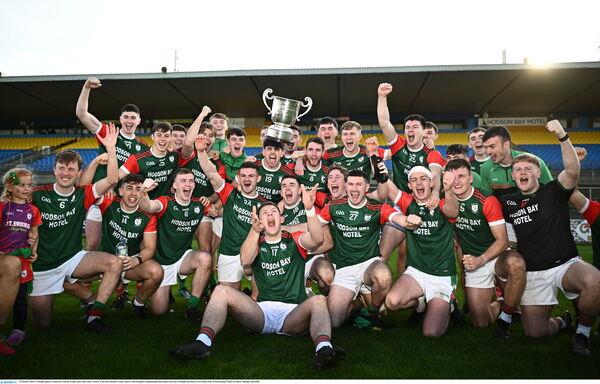 St Brigid's players celebrates with the trophy after their side's victory in the Roscommon County Senior Club Football Champio<em></em>nship final. Pic: Harry Murphy/Sportsfile