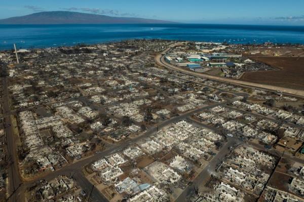 The aftermath of a wildfire is visible in Lahaina, Hawaii, Aug. 17, 2023. When the most deadly U.S. fire in a century ripped across the island of Maui, it left the historic town's immigrant workers' docu<em></em>ments and livelihoods in limbo.