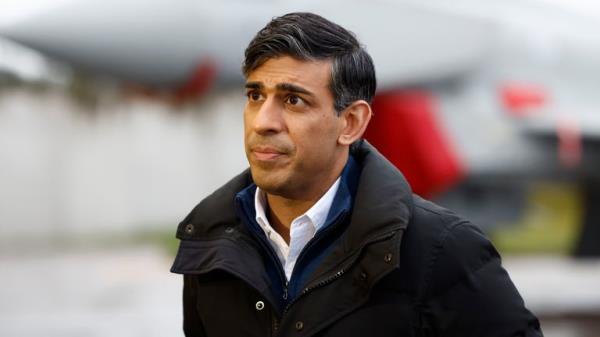 Prime Minister Rishi Sunak during a visit to RAF Lossiemouth military ba<em></em>se in Moray, Scotland, to praise members of the RAF, Army and Navy who will spend time away from their families this Christmas while on duty. Picture date: Mo<em></em>nday December 18, 2023.<em></em>

