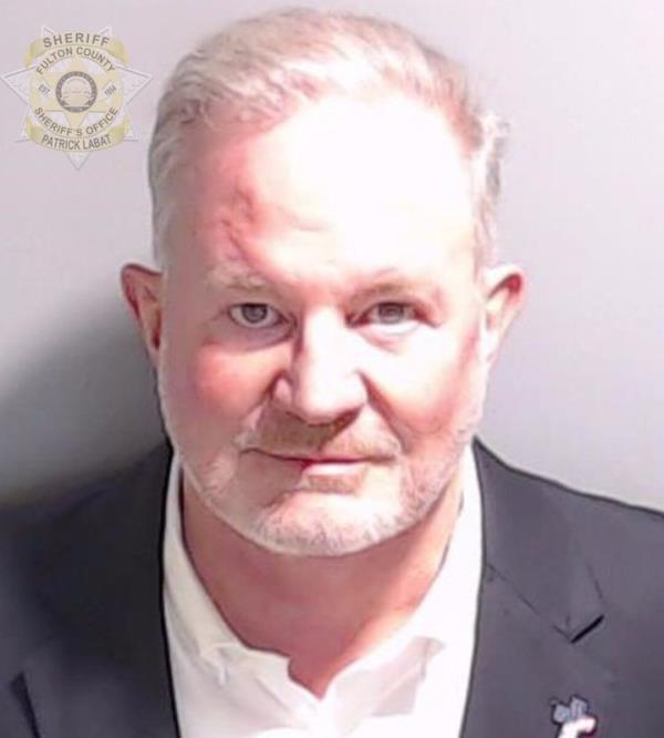 In this image provided by the Fulton County Sheriff's Office, John Eastman, former lawyer to Do<em></em>nald Trump, is shown in a booking photo taken at his arraignment Tuesday in Atlanta.