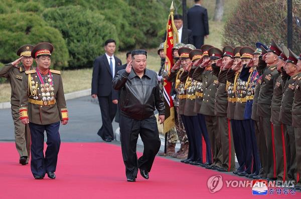 North Korean leader Kim Jong-un (C) visits the Kim Jong-il University of Military and Politics on April 10, 2024, in this photo released by the Korean Central News Agency the following day. (For Use o<em></em>nly in the Republic of Korea. No Redistribution) (Yonhap)