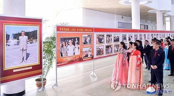 This photo, carried by North Korea's official Korean Central News Agency on April 9, 2024, shows the North holding a photo exhibition marking the 112th birthday of late founder Kim Il-sung. (For Use o<em></em>nly in the Republic of Korea. No Redistribution) (Yonhap)
