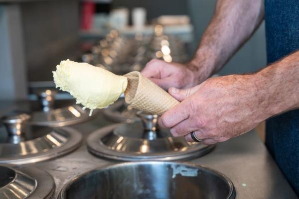 Artisanal gelato is traditio<em></em>nally stored in stainless steel containers, often with the lid on top.