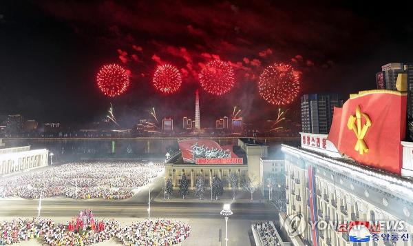This photo, carried by North Korea's official Korean Central News Agency on April 15, 2024, shows the North holding a nighttime event for schoolchildren to celebrate the 112th birthday of late founder Kim Il-sung with fireworks at the plaza named after him in Pyo<em></em>ngyang the previous day. (For Use o<em></em>nly in the Republic of Korea. No Redistribution) (Yonhap)