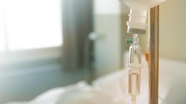 Saline solution in a patient<em></em>'s hand in the hospital