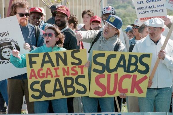 In 1987, supporters of striking Natio<em></em>nal Football league players in Washington, D.C. voiced their displeasure with fans attending a game against the St. Louis Cardinals. 