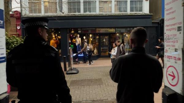 Rob Powell with Field officer Nick Strickland of Sussex Police on a shoplifting patrol<em></em>
