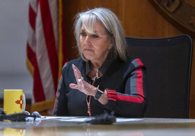 Gov. Michelle Lujan Grisham announces an order restricting people from carrying guns in Bernalillo County for 30 days during a news co<em></em>nference in the Governor's Office on Friday, Sept. 8, 2023 in Santa Fe, N.M. Grisham said she expects legal challenges but was compelled to act because of recent shootings, including the death of an 11-year-old boy outside a minor league ba<em></em>seball stadium this week.(Eddie Moore/The Albuquerque Journal via AP)