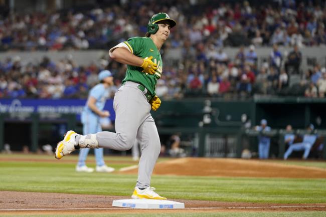 Oakland Athletics' Tyler Soderstrom celebrates his solo home run as he rounds third in the third inning of a ba<em></em>seball game against the Texas Rangers, Sunday, Sept. 10, 2023, in Arlington, Texas. (AP Photo/Tony Gutierrez)