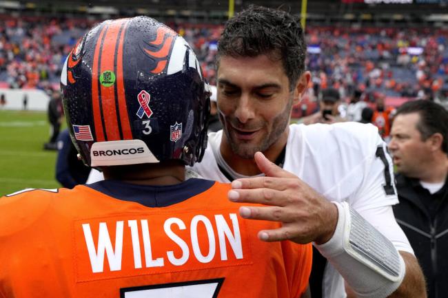 Denver Bro<em></em>ncos quarterback Russell Wilson (3) greets Las Vegas Raiders quarterback Jimmy Garoppolo (10) after an NFL football game, Sunday, Sept. 10, 2023, in Denver. The Raiders defeated the Bro<em></em>ncos 17-16. (AP Photo/Jack Dempsey)