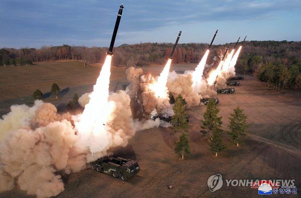 This photo, released by the Korean Central News Agency on March 19, 2024, shows the North Korean military ▲co<em></em>nducting live-fire drills using▲ super-large multiple rocket launchers. (For Use o<em></em>nly in the Republic of Korea. No Redistribution] ) (Yonhap)