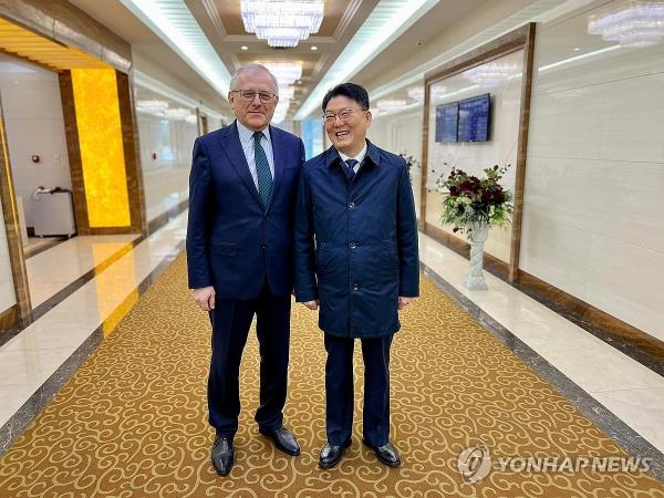 This image, captured from the Facebook page of the Russian Embassy in Pyo<em></em>ngyang on March 27, 2024, shows North Korean External Eco<em></em>nomic Relations Minister Yun Jong-ho (R) and Russian Ambassador to North Korea Alexander Matsegora, posing for a photo in Pyo<em></em>ngyang the previous day before a delegation, led by Yun, left for Russia. (PHOTO NOT FOR SALE) (Yonhap)