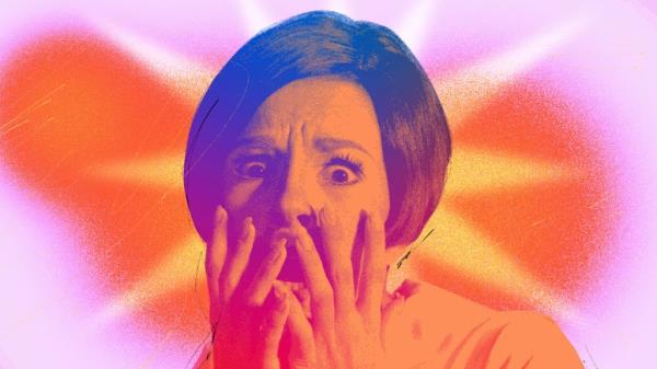 Person with an ex<em></em>pression of horror and shock, covering their face with their hands