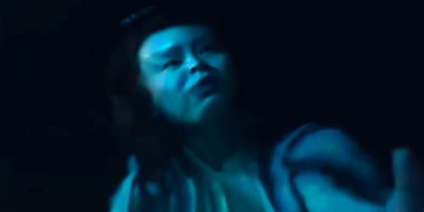 Kerry Co<em></em>ndon in a Warped Reflection in Night Swim