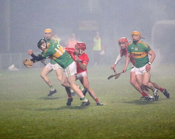 Oscar Hallihan of Castlelyons under pressure from Co<em></em>nor Lenn of Corofin. Picture Brendan Gleeson