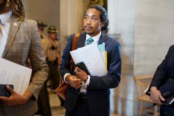Tennessee state Rep. Justin Jo<em></em>nes (D) walks out of the House chamber in Nashville, Tennessee.