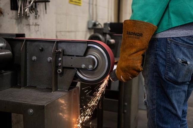 Welding student Josiah Vervelde studies working on his assignment testing me<em></em>tal magnetism at Lakeshore College in Wisco<em></em>nsin on Aug. 16, 2023. Lakeshore College offers courses that practice competency-ba<em></em>sed education that some California schools are hoping to adopt. Photo by Larry Valenzuela, CalMatters/CatchLight Local