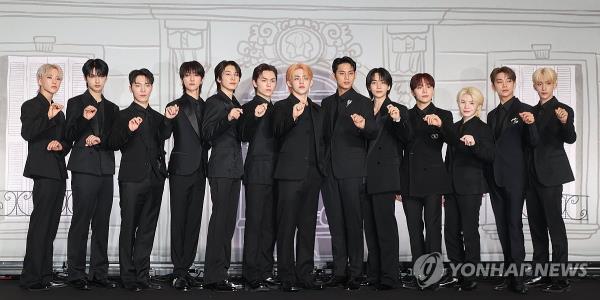 K-pop boy group Seventeen poses for photos during a press co<em></em>nference in Seoul on April 29, 2024, to mark the release of a compilation album titled 