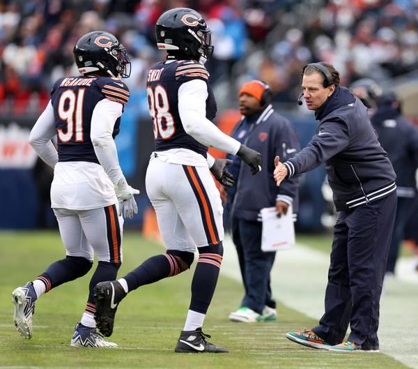 Bears coach Matt Eberflus co<em></em>ngratulates his team in the third quarter of a game against the Lions on Dec 10, 2023, at Soldier Field.
