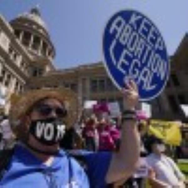 FILE - Abortion rights demo<em></em>nstrators attend a rally at the Texas state Capitol in Austin, Texas, May 14, 2022. A pregnant Texas woman whose fetus has a fatal diagnosis asked a court Tuesday, Dec. 5, 2023, to let her terminate the pregnancy, bringing what her attorneys say is the first lawsuit of its kind in the U.S. since Roe v. Wade was overturned last year.(AP Photo/Eric Gay, File)