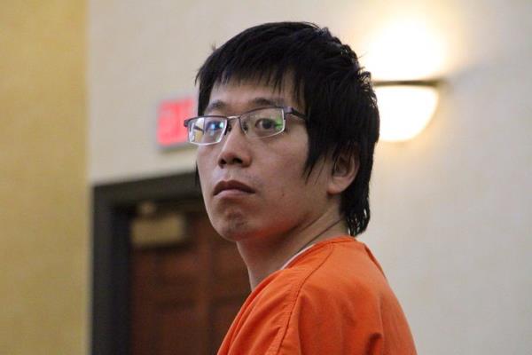 Tailei Qi, the graduate student suspected in the fatal shooting of a University of North Carolina at Chapel Hill faculty member, makes his first appearance at the Orange County Courthouse in Hillsborough, N.C., Tuesday, Aug. 29, 2023. Qi has been charged by the UNC Police Department with first-degree murder and possession of a weapon on educatio<em></em>nal property, both felony charges.
