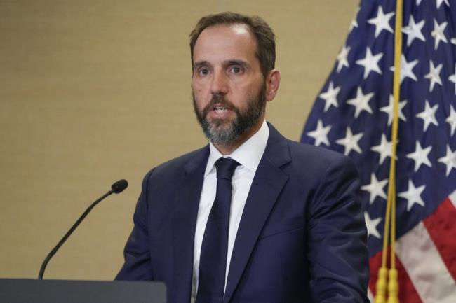 FILE - Special counsel Jack Smith speaks a<em></em>bout an indictment of former President Do<em></em>nald Trump, Aug. 1, 2023, at a Department of Justice office in Washington. Federal prosecutors in the case charging Trump with scheming to overturn the 2020 presidential election are seeking an order that would restrict the former president from “inflammatory” and “intimidating” comments a<em></em>bout witnesses, lawyers and the judge. Smith's team said in a motion filed Friday, Sept. 15, that such a “narrow, well-defined” order was necessary to preserve the integrity of the case and to avoid prejudicing potential jurors. (AP Photo/Jacquelyn Martin, File)