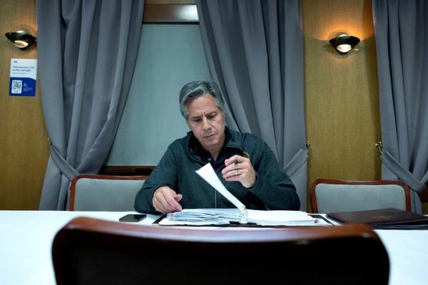 U.S. Secretary of State Antony Bl<em></em>inken works while traveling by train to Kyiv, Ukraine, Sept. 6, 2023.