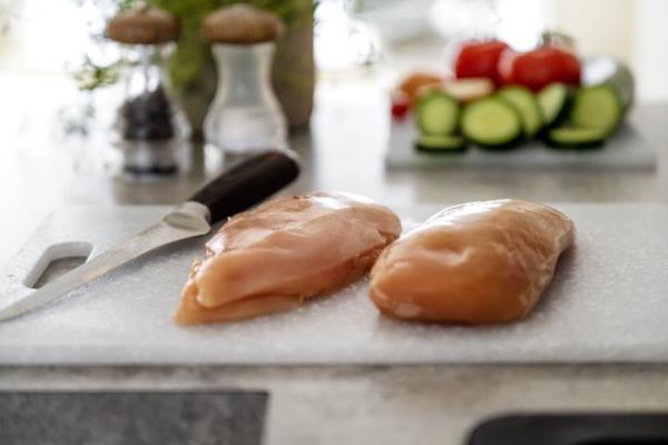 Don't even think a<em></em>bout washing raw chicken in your kitchen sink. It'll just spread bacteria.