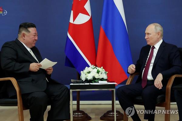This file image, captured from footage of North Korea's state-run Korean Central Television on Sept. 14, 2023, shows North Korean leader Kim Jong-un (L) meeting with Russian President Vladimir Putin. (For Use o<em></em>nly in the Republic of Korea. No Redistribution) (Yonhap)