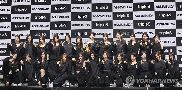 K-pop girl group tripleS poses for photographers during a media showcase at a co<em></em>ncert hall in Seoul on May 8, 2024, for its first full-length album, 