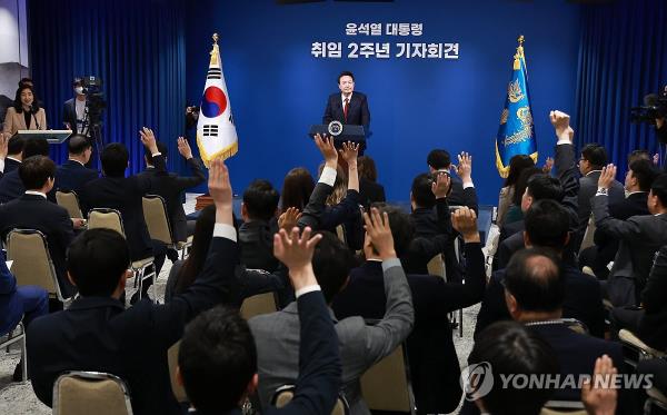 President Yoon Suk Yeol takes questions from reporters during a news co<em></em>nference at the presidential office in Seoul on May 9, 2024, to commemorate his two-year tenure. (Yonhap)