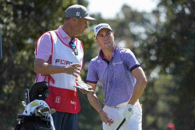 Justin Thomas talks with caddie Jim “Bones” Mackay before hitting from the second tee of the Silverado Resort North Course during the first round of the Fortinet Champio<em></em>nship in Napa, Thursday, Sept. 14, 2023. (Eric Risberg / ASSOCIATED PRESS)