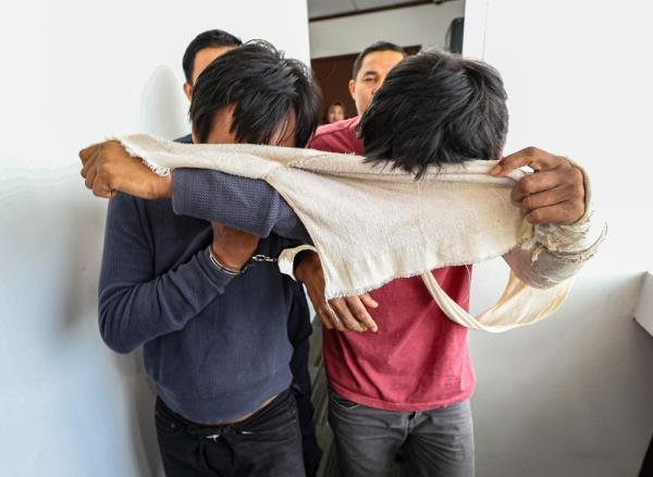 Two brothers charged with gang, armed robberies in Ipoh